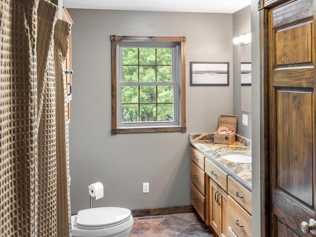 2406 Augusta Rd, Fair Haven Twp, MN 55382 - full bathroom with vanity, stone finish floors, and curtained shower
