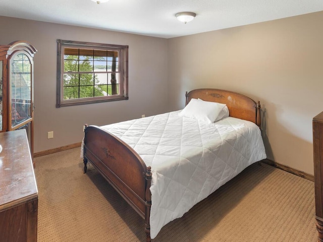 2406 Augusta Rd, Fair Haven Twp, MN 55382 - bedroom featuring light carpet and baseboards