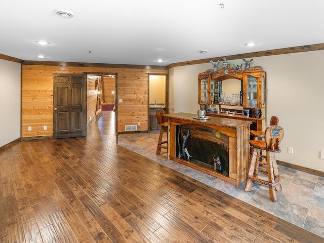 2406 Augusta Rd, Fair Haven Twp, MN 55382 - unfurnished living room featuring wood walls, recessed lighting, and wood finished floors