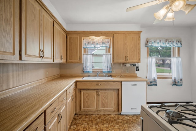 1306 Ryan Ave W, Roseville, MN 55113 - kitchen with white dishwasher, light countertops, ceiling fan, and range