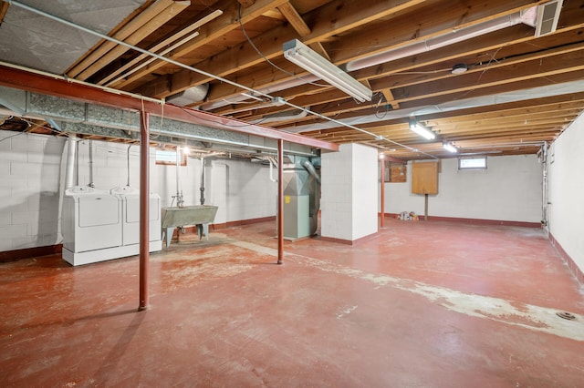 1306 Ryan Ave W, Roseville, MN 55113 - basement featuring independent washer and dryer and heating unit