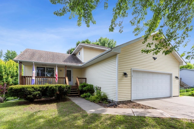 11817 51st St NE, Albertville, MN 55301 - view of front facade featuring an attached garage, concrete driveway, a front lawn, a shingled roof, and covered porch