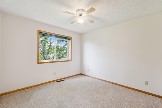 11817 51st St NE, Albertville, MN 55301 - carpeted spare room with a ceiling fan and a textured ceiling