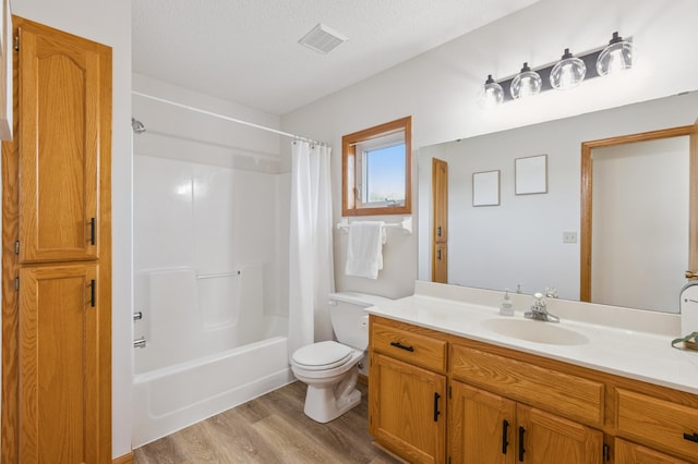 11817 51st St NE, Albertville, MN 55301 - full bath with vanity, wood finished floors, and shower / bath combo