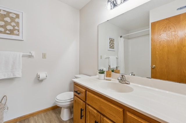 11817 51st St NE, Albertville, MN 55301 - bathroom featuring vanity, wood finished floors, and curtained shower