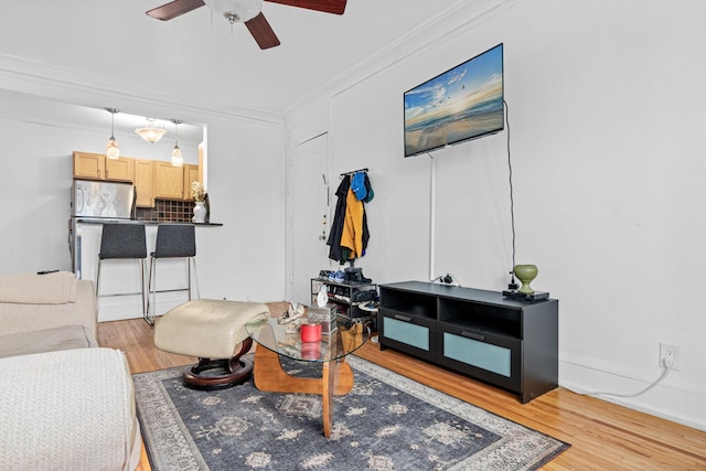 1820 1st Ave S Unit 208, Minneapolis, MN 55403 - living room featuring ceiling fan, light wood-style floors, and crown molding