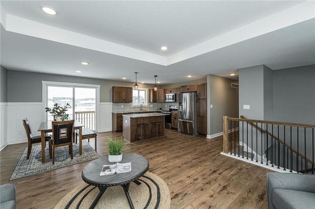 2105 Elk Run Dr SE, Pine Island, MN 55963 - living area featuring dark wood-style flooring and recessed lighting