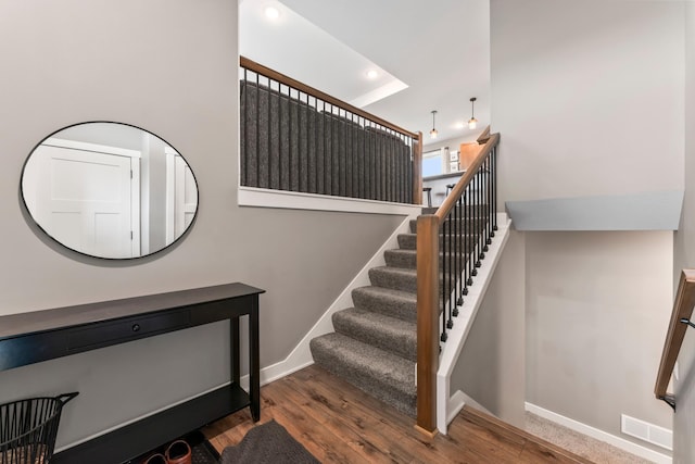 2105 Elk Run Dr SE, Pine Island, MN 55963 - stairway featuring wood finished floors and recessed lighting