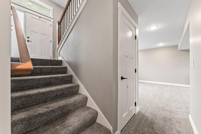 2105 Elk Run Dr SE, Pine Island, MN 55963 - staircase featuring carpet flooring and recessed lighting