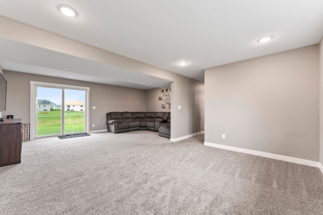 2105 Elk Run Dr SE, Pine Island, MN 55963 - unfurnished living room with carpet floors and recessed lighting
