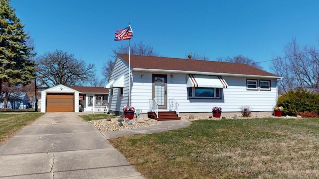715 3rd Ave, Albert Lea, MN 56007 - ranch-style house with a front yard, concrete driveway, and a shingled roof