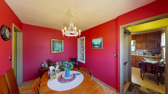 715 3rd Ave, Albert Lea, MN 56007 - dining room featuring a chandelier and baseboards