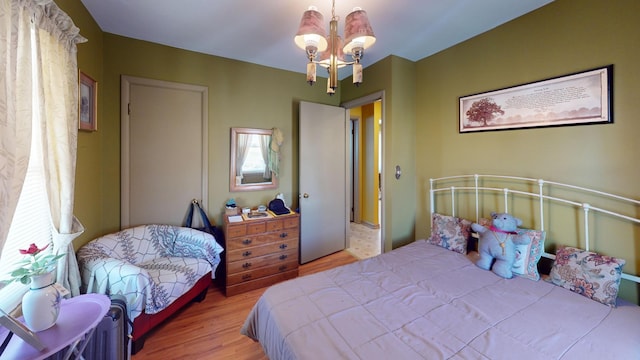 715 3rd Ave, Albert Lea, MN 56007 - bedroom featuring a chandelier and wood finished floors