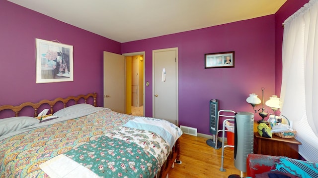 715 3rd Ave, Albert Lea, MN 56007 - bedroom with wood finished floors and baseboards