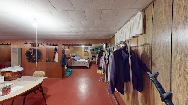 715 3rd Ave, Albert Lea, MN 56007 - miscellaneous room featuring wood walls and concrete floors