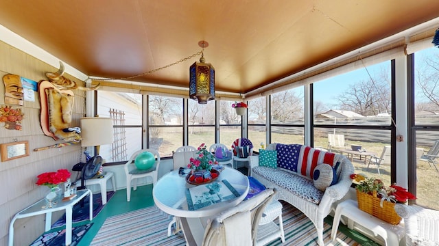 715 3rd Ave, Albert Lea, MN 56007 - sunroom / solarium featuring plenty of natural light and outdoor dining area