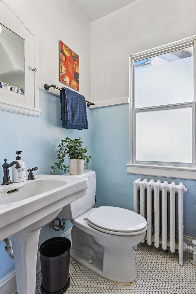 3252 Fremont Ave S Unit 102, Minneapolis, MN 55408 - bathroom with radiator and toilet