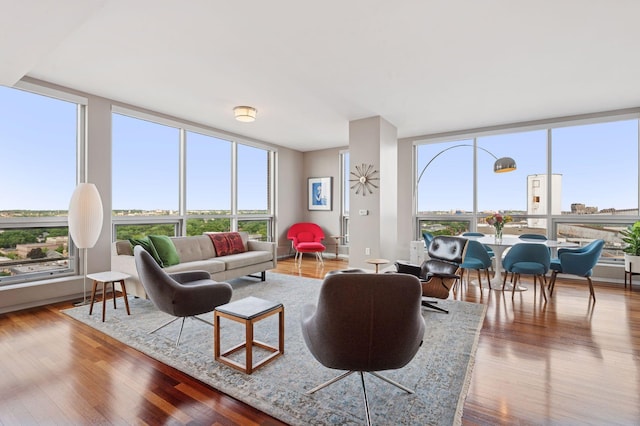 222 2nd St SE Unit 1503, Minneapolis, MN 55414 - living room featuring wood finished floors and floor to ceiling windows