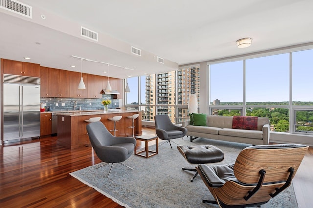 222 2nd St SE Unit 1503, Minneapolis, MN 55414 - living room with dark wood finished floors