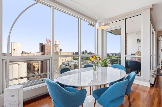 222 2nd St SE Unit 1503, Minneapolis, MN 55414 - sunroom / solarium featuring a city view and lofted ceiling