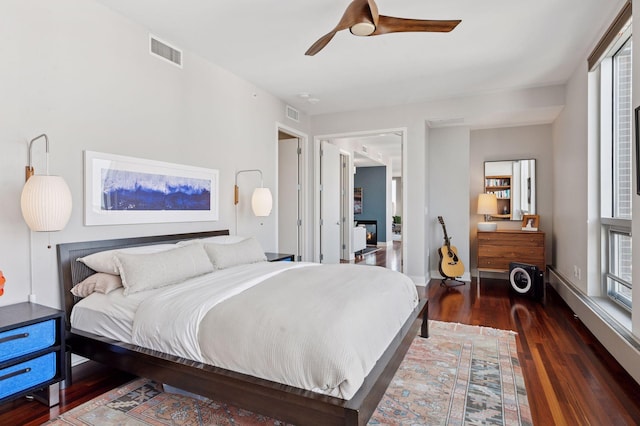 222 2nd St SE Unit 1503, Minneapolis, MN 55414 - bedroom featuring wood finished floors and ceiling fan