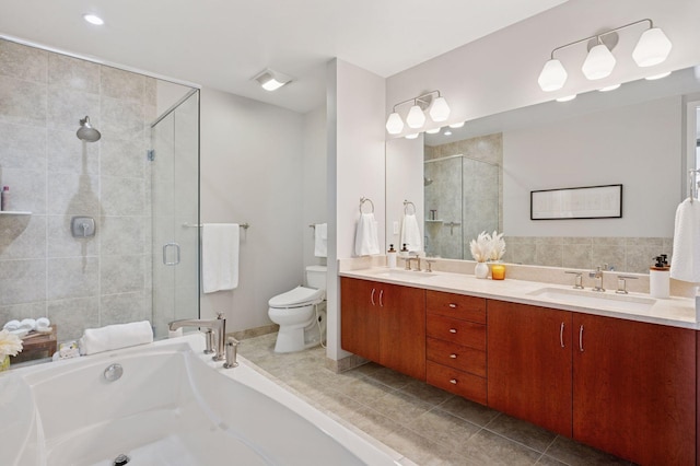 222 2nd St SE Unit 1503, Minneapolis, MN 55414 - full bathroom with a stall shower, double vanity, a bath, and tile patterned flooring