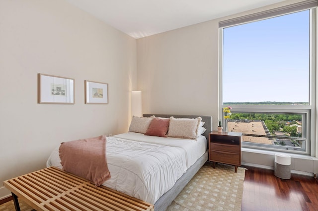 222 2nd St SE Unit 1503, Minneapolis, MN 55414 - bedroom featuring wood finished floors