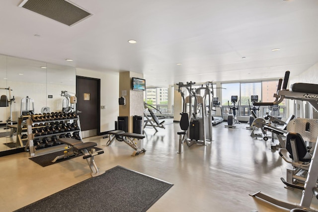 222 2nd St SE Unit 1503, Minneapolis, MN 55414 - exercise room with healthy amount of natural light, floor to ceiling windows, and recessed lighting