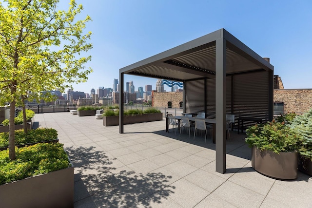 222 2nd St SE Unit 1503, Minneapolis, MN 55414 - view of patio with a skyline view and outdoor dining space