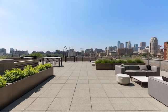 222 2nd St SE Unit 1503, Minneapolis, MN 55414 - view of patio featuring a view of skyline and an outdoor hangout area