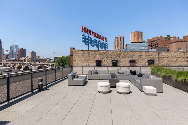 222 2nd St SE Unit 1503, Minneapolis, MN 55414 - view of patio / terrace featuring a view of skyline and an outdoor living space