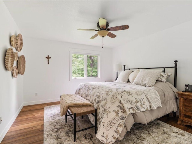 11034 Forest View Ct SW, Nisswa, MN 56468 - bedroom with wood finished floors and ceiling fan