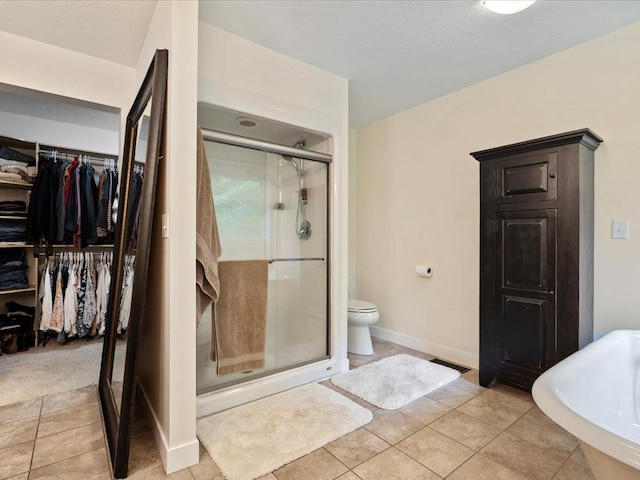 11034 Forest View Ct SW, Nisswa, MN 56468 - full bath featuring a stall shower, tile patterned floors, and a walk in closet