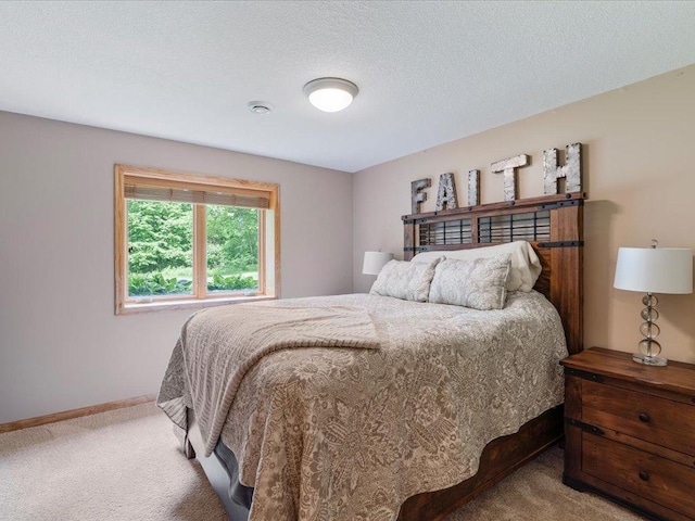 11034 Forest View Ct SW, Nisswa, MN 56468 - carpeted bedroom featuring baseboards and a textured ceiling