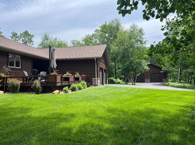 11034 Forest View Ct SW, Nisswa, MN 56468 - view of home's exterior with a yard and a wooden deck
