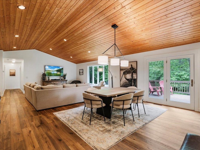 11034 Forest View Ct SW, Nisswa, MN 56468 - dining space featuring lofted ceiling, wooden ceiling, plenty of natural light, wood finished floors, and recessed lighting