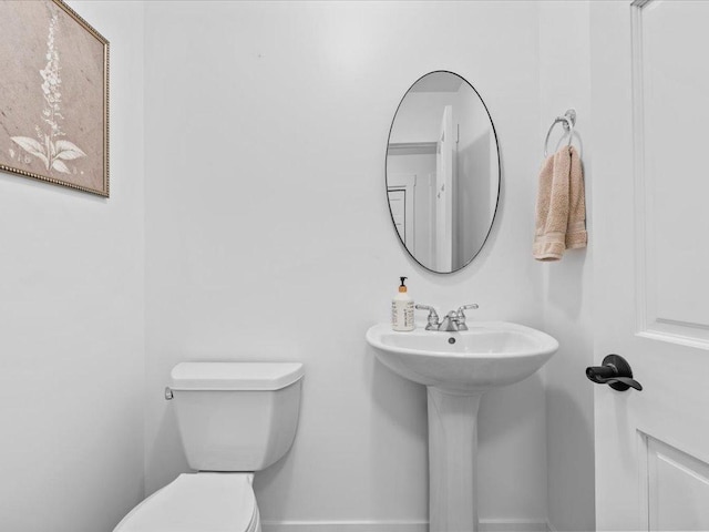 11034 Forest View Ct SW, Nisswa, MN 56468 - half bathroom with toilet and a sink
