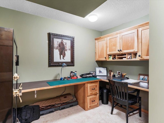 11034 Forest View Ct SW, Nisswa, MN 56468 - office featuring light carpet, a textured ceiling, and built in study area
