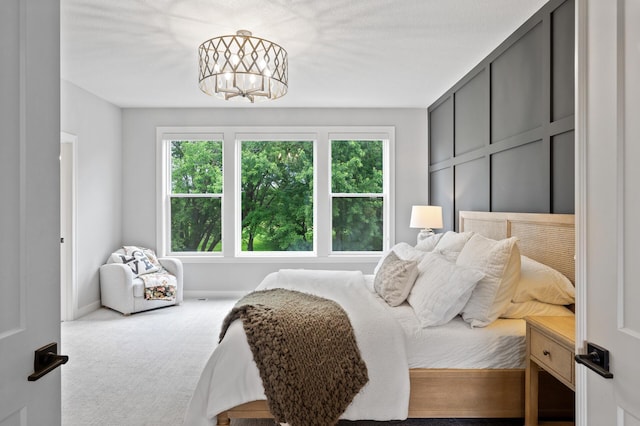 4452 167th Ave NW, Andover, MN 55304 - bedroom with a chandelier, multiple windows, and carpet