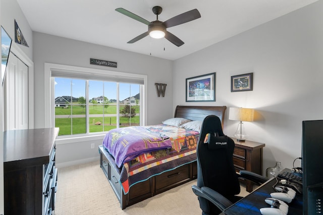 4452 167th Ave NW, Andover, MN 55304 - bedroom featuring light colored carpet, an office area, and ceiling fan
