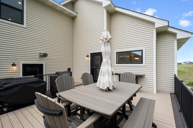 4452 167th Ave NW, Andover, MN 55304 - wooden terrace with a grill and outdoor dining space