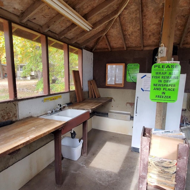 13240 Devils Lake Rd NW Unit 20, Brandon, MN 56315 - miscellaneous room with unfinished concrete floors and lofted ceiling