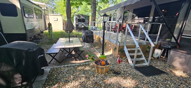 13240 Devils Lake Rd NW Unit 20, Brandon, MN 56315 - view of yard featuring outdoor dining area, a deck, and a patio