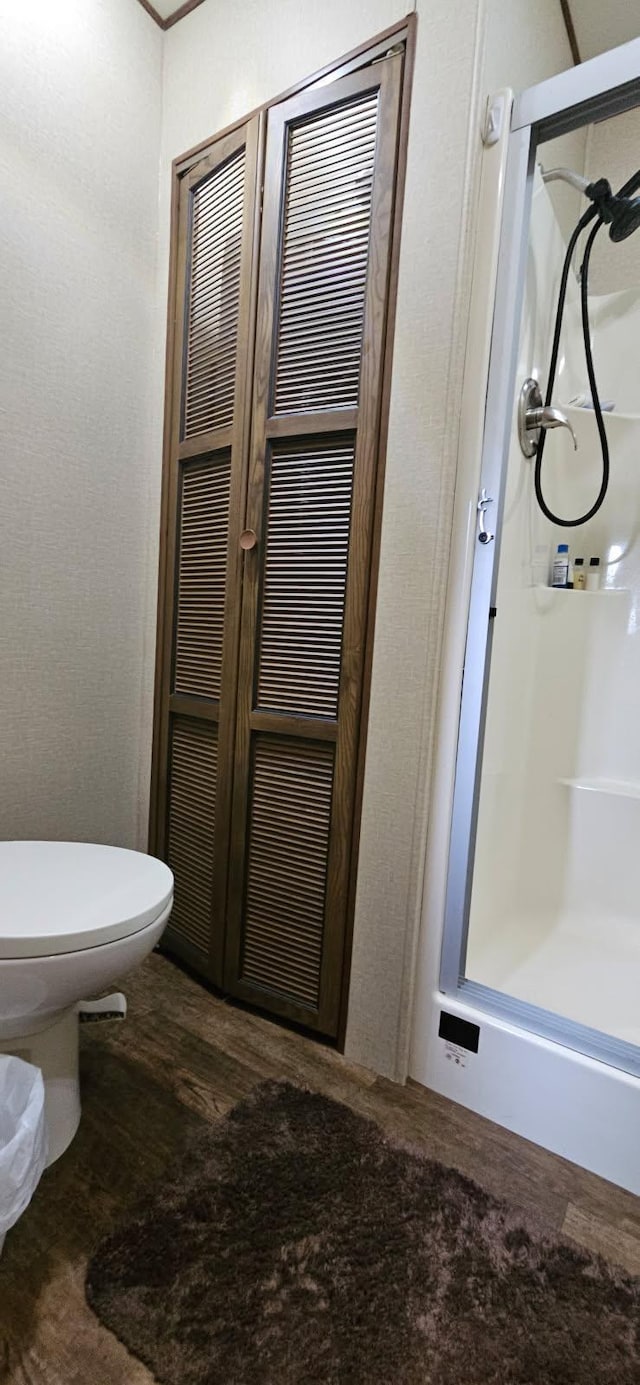 13240 Devils Lake Rd NW Unit 20, Brandon, MN 56315 - full bath featuring a shower stall, wood finished floors, and a closet