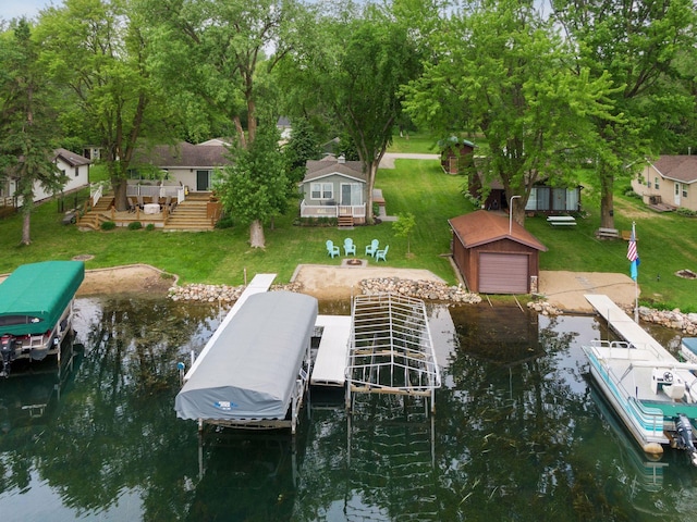 7315 120th St NW, Annandale, MN 55302 - dock area featuring boat lift, a yard, and a water view