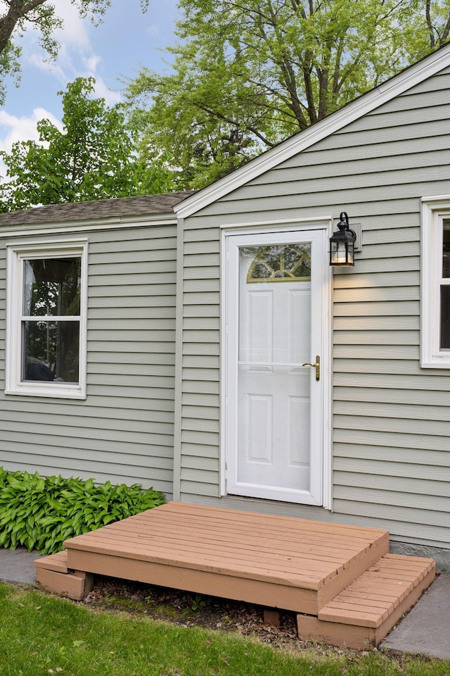 7315 120th St NW, Annandale, MN 55302 - property entrance featuring a shingled roof