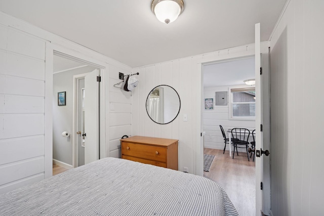 7315 120th St NW, Annandale, MN 55302 - bedroom with wood finished floors and electric panel