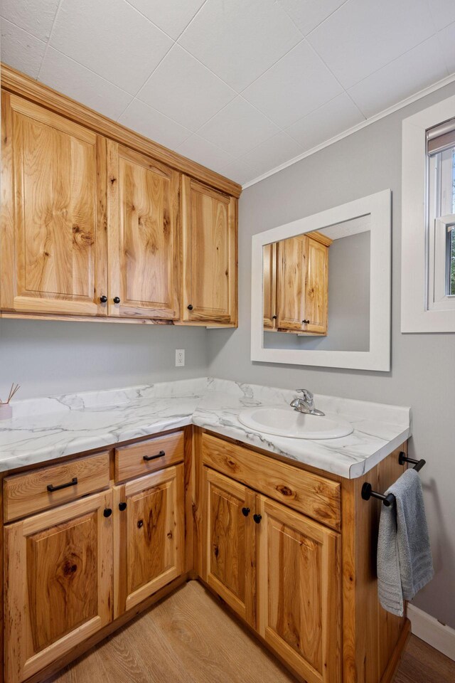 7315 120th St NW, Annandale, MN 55302 - kitchen with light wood-style flooring and crown molding