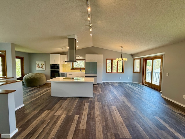 14303 Utica Ave, Savage, MN 55378 - kitchen with extractor fan, open floor plan, dark wood finished floors, white cabinets, and a textured ceiling