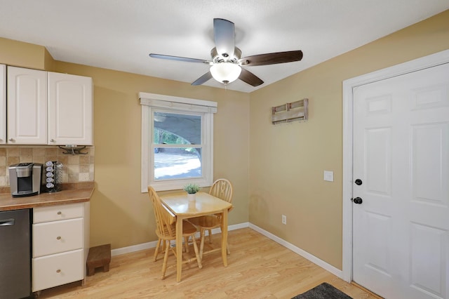 6788 147th St W, Savage, MN 55378 - dining area with light wood finished floors and ceiling fan